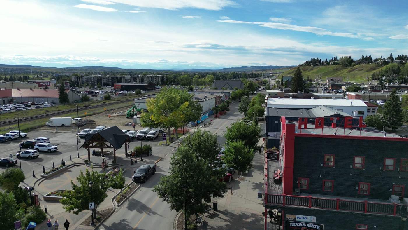 Cochrane from above 1st Street West: the hotel block, the rail yard and the foothills on the horizon